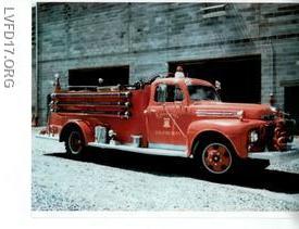 1965 picture of the First Engine of the Libertytown Volunteer Fire Department. Note the fire station is under construction 