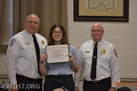 Chief Tom Coe and Deputy Chief Shane Dawrick recently presented LVFD member Madelyn Prabe with the John Carnigis  Academic Achievement Award,